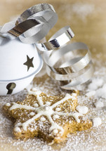 star Christmas cookie and bell with ribbon 