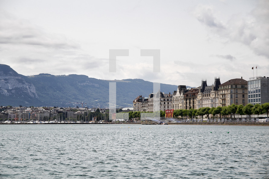 marina and buildings along a shoreline in Switzerland 