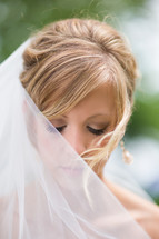 bride under a veil 