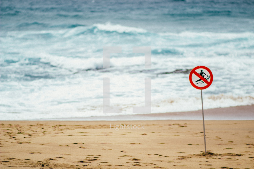 No surfing sign on a beach 