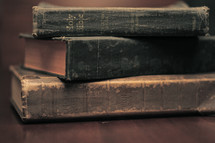 stack of books and a Bible 