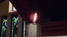 Prayer candle extinguished out in old church