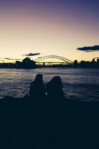 women looking out at Sydney Harbour Bridge