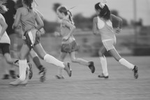 girls playing youth soccer 