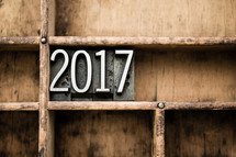 2017 blocks on bookshelf 