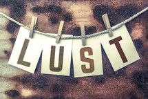 word lust on a clothesline 
