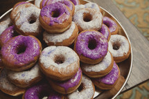 Glazed doughnuts with colored icing