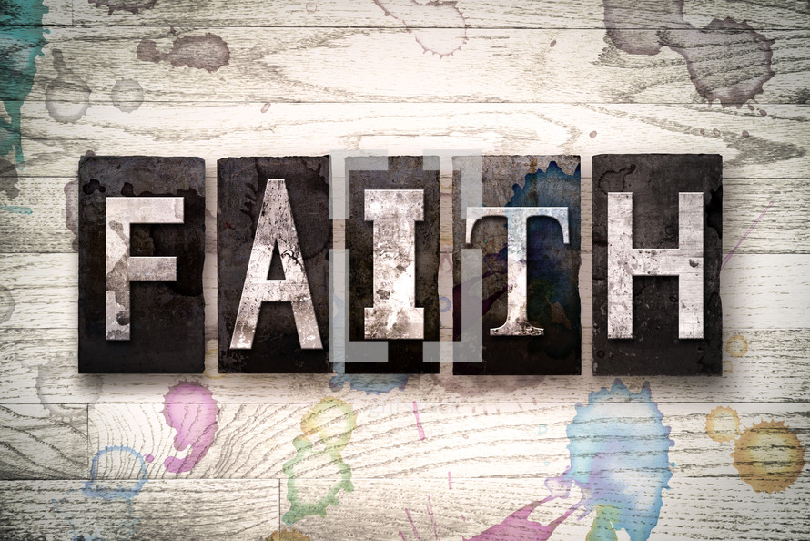 word faith on white washed wood