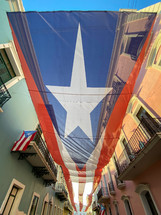 Cuban flag over the streets of Cuba 