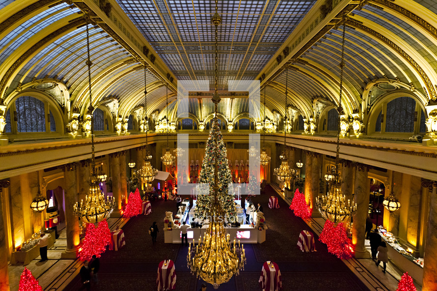 large Christmas tree in a grand hotel lobby