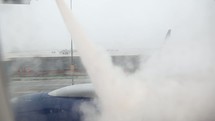 plane deicing on the runway 