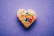 heart shaped cookie with sprinkles 