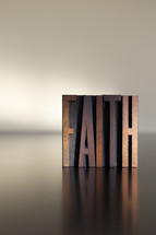 word faith in wood blocks