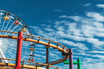 roller coaster against a blue sky 