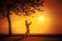 golfer at sunset 