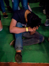 kneeling man praying 