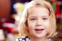 face of smiling toddler girl 