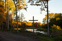 fall forest, river, and cross