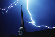 Lightning over church steeple. Taken on a Sunday night.