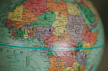 A world globe showing Africa.