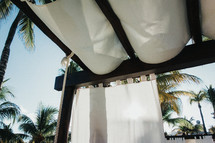 fabric canopy over a pergola 