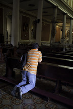 METROPOLITAN CATHEDRAL IN SAN JOSE, COSTA RICA, Man in prayer