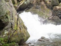 flowing water over rocks 
