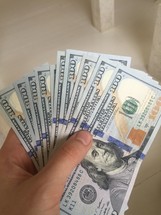 hand full of cash 