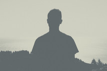 A silhouette of a man. 