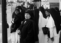 nuns walking down a street in Rome 