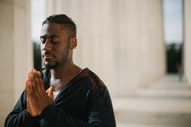 African American man in prayer 