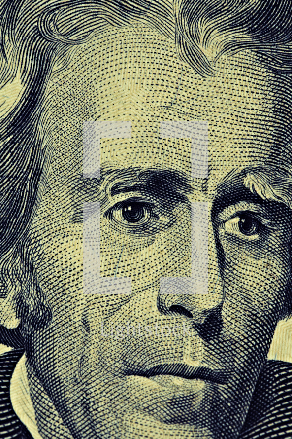 An extreme closeup of Andrew Jackson on the twenty dollar bill
