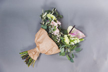 a bouquet of flowers on a gray background 