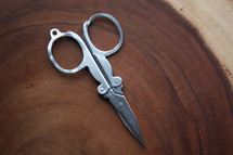 scissors on wood 