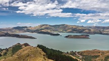 Panorama view of lake in New Zealand landscape in sunny summer day Time lapse
