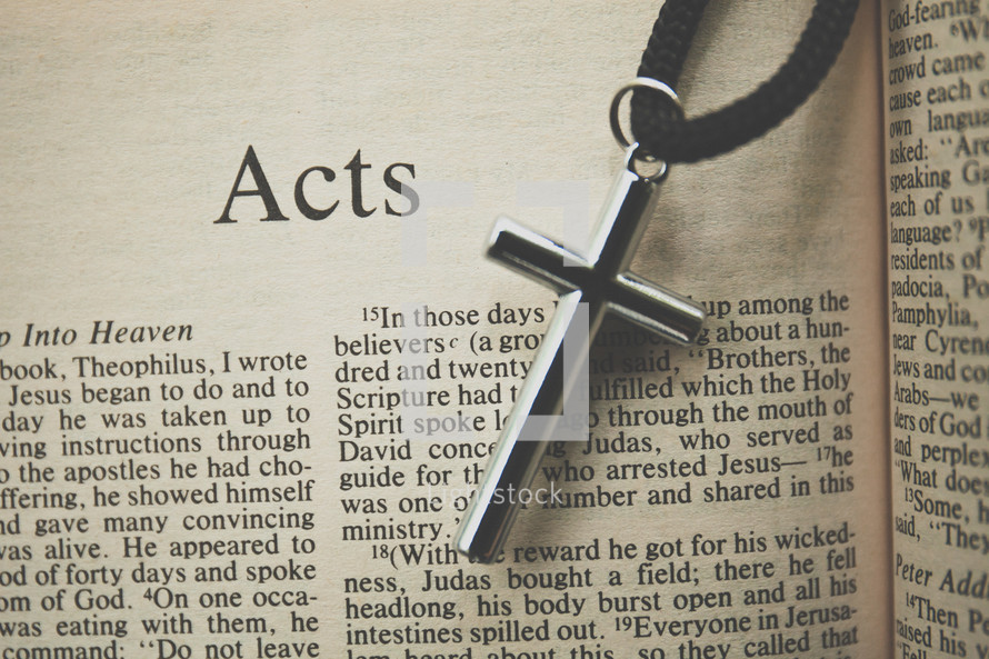 Acts and a cross necklace 