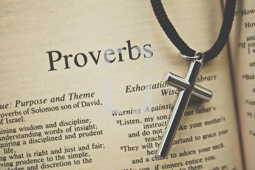 Proverbs and a cross necklace 