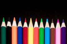 row of colored pencils 