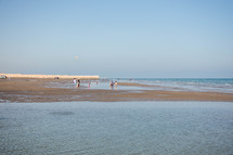 people on a beach in Oman 