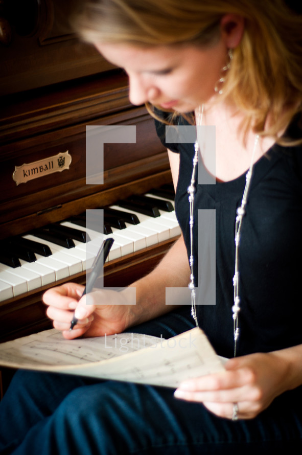 woman writing music 