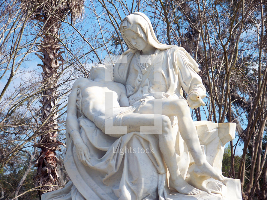 statue of crucified Jesus and Mother Mary 