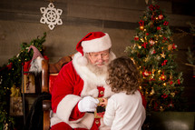 toddler girl with Santa Claus 