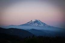 snow capped mountain peak at sunrise 