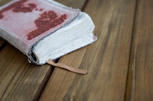 Bible on a wood floor 