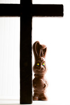 cross and a chocolate Easter bunny