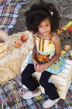 smiling fall portrait of an African American girl child 