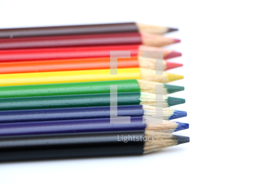row of rainbow colored pencils 