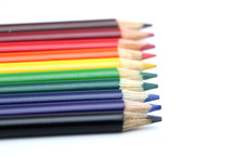 row of rainbow colored pencils 