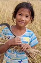 a girl in the fields in Nepal 