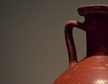 A red clay urn.